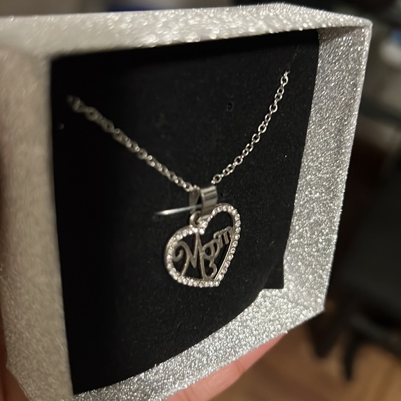 Cute little mom necklace. Silver with diamonds and mom designed in cursive. - Picture 3 of 3